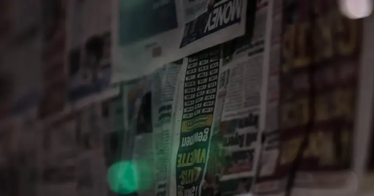 Newspaper article in dark moody lighting